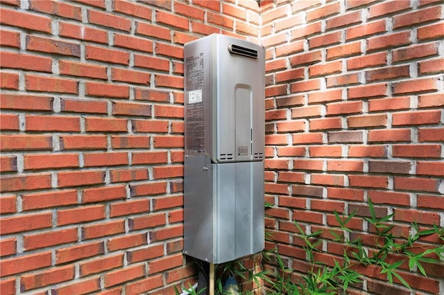 6659 Viking Way, Mobile, AL 36582 - exterior view of brick siding and water heater