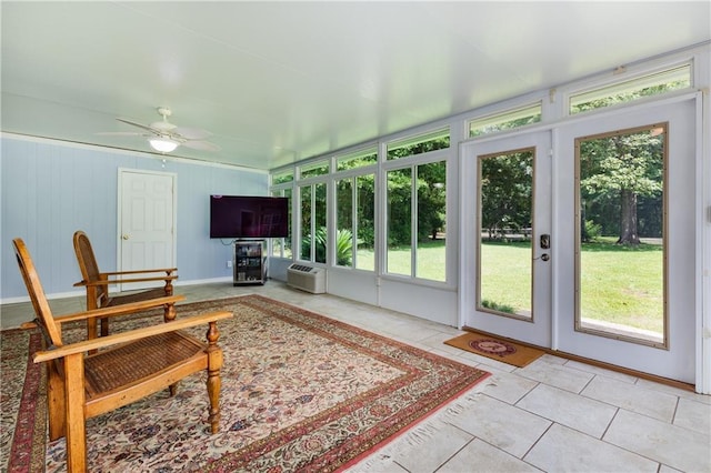 6659 Viking Way, Mobile, AL 36582 - sunroom / solarium with plenty of natural light, a wall unit AC, french doors, and tile patterned flooring