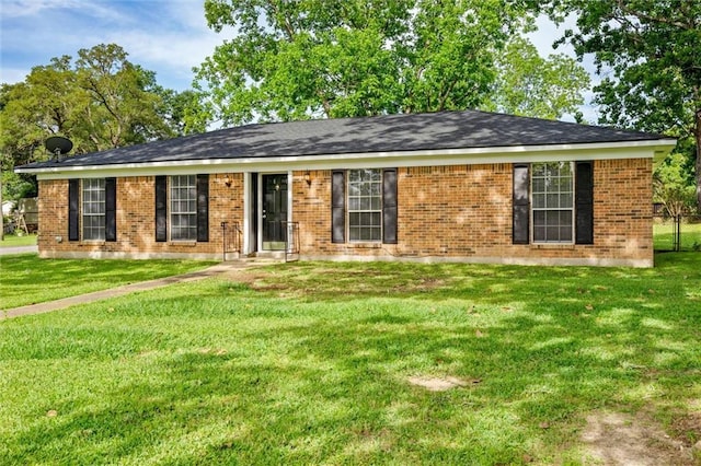 ranch-style home with a front yard