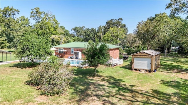 exterior space with a front lawn and a shed