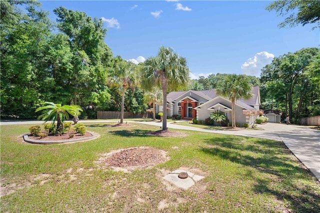 2765 Knollwood Dr, Mobile, AL 36693 - view of property hidden behind natural elements featuring driveway