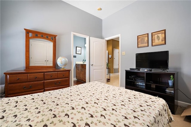 2765 Knollwood Dr, Mobile, AL 36693 - bedroom with high vaulted ceiling, baseboards, and ensuite bathroom