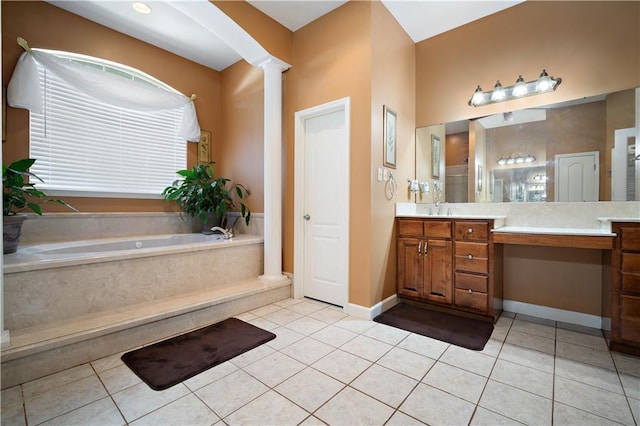 2765 Knollwood Dr, Mobile, AL 36693 - bathroom with vanity, tile patterned flooring, a bath, and ornate columns