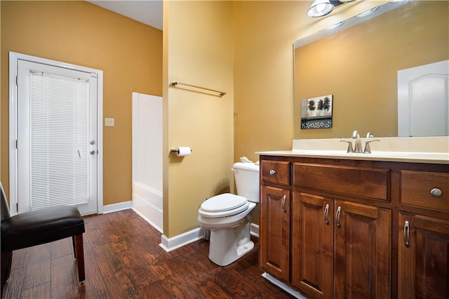 2765 Knollwood Dr, Mobile, AL 36693 - bathroom featuring toilet, wood finished floors, baseboards, and vanity