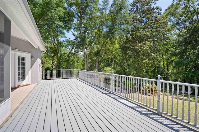 2765 Knollwood Dr, Mobile, AL 36693 - wooden deck with view of wooded area