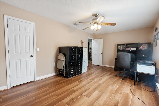 office area featuring hardwood / wood-style floors and ceiling fan