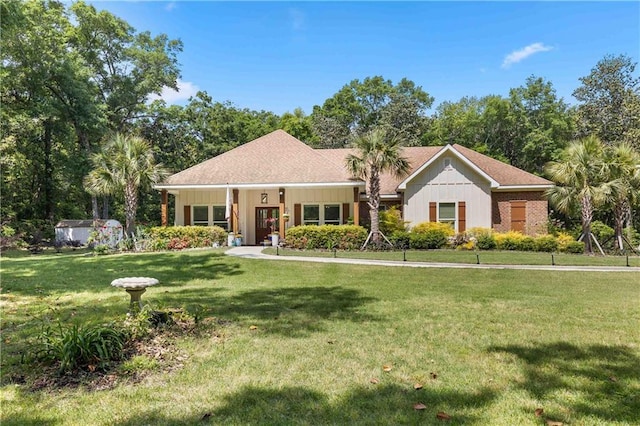 ranch-style home featuring a front yard