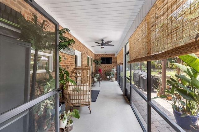 exterior space with a ceiling fan