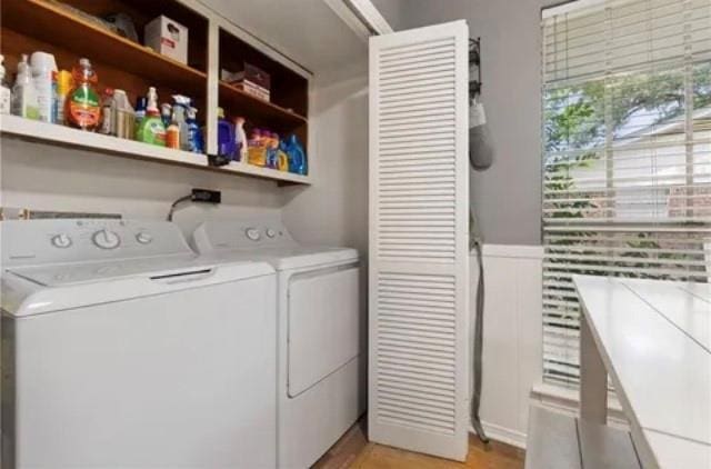 laundry area with washing machine and dryer