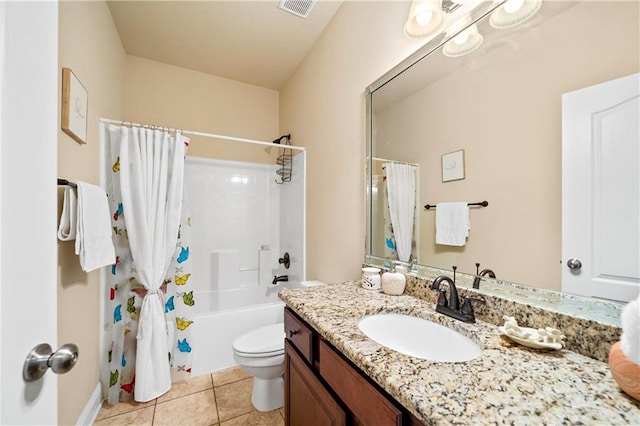 full bathroom featuring tile patterned floors, vanity, toilet, and shower / tub combo