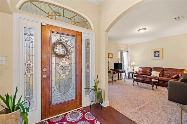 foyer featuring dark hardwood / wood-style floors