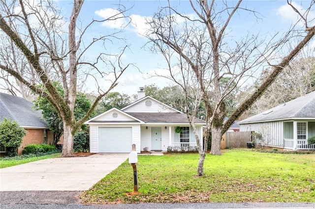 view of front of property featuring a chimney, an attached garage, a front yard, fence, and driveway