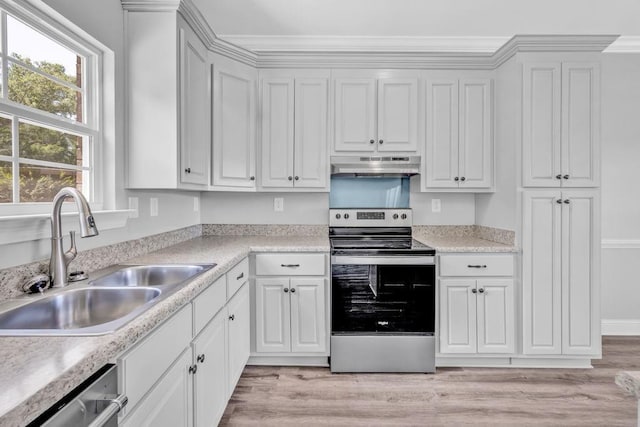 21621 Coleman Cemetery Rd, Moss Point, MS 39562 - kitchen with appliances with stainless steel finishes, under cabinet range hood, a sink, light countertops, and light wood-style floors