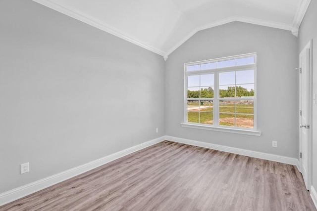 21621 Coleman Cemetery Rd, Moss Point, MS 39562 - spare room featuring wood finished floors, vaulted ceiling, baseboards, and ornamental molding