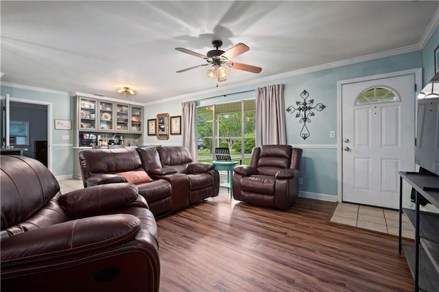 513 Samauri Ct, Saraland, AL 36571 - living room featuring ceiling fan, ornamental molding, light wood-style floors, and baseboards