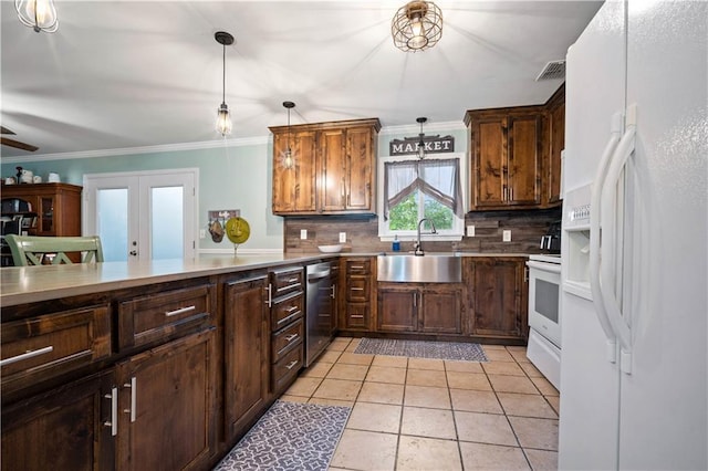 513 Samauri Ct, Saraland, AL 36571 - kitchen featuring white appliances, a sink, decorative backsplash, french doors, and ornamental molding