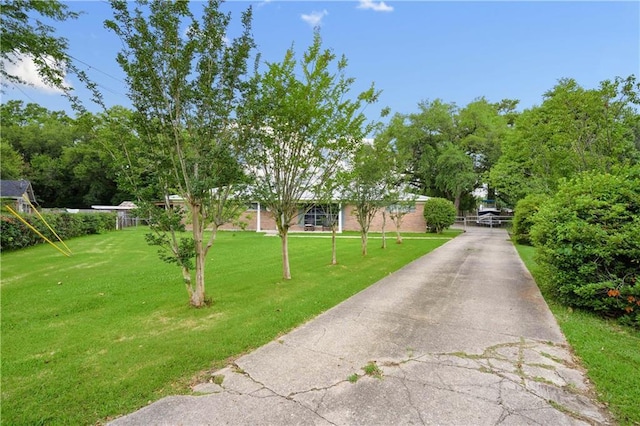 513 Samauri Ct, Saraland, AL 36571 - view of front of house featuring a front yard