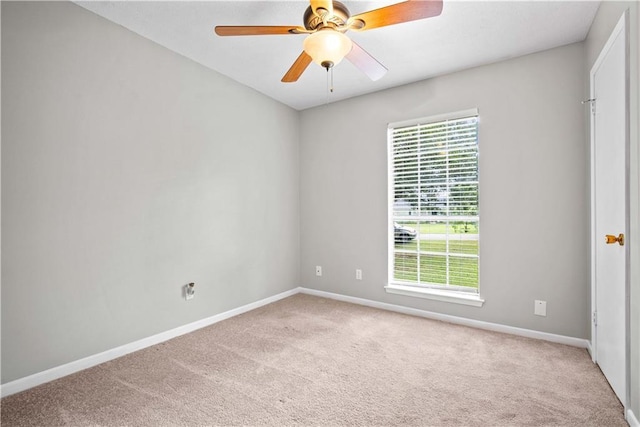 unfurnished room with light carpet and ceiling fan