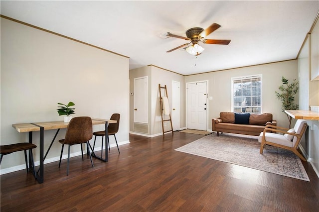 living room featuring ceiling fan, crown molding, and dark hardwood / wood-style floors