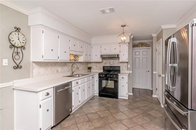 7250 Pine Station Rd S, Mobile, AL 36695 - kitchen featuring stainless steel appliances, a sink, under cabinet range hood, tasteful backsplash, and ornamental molding
