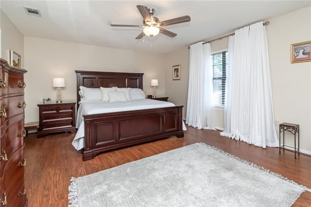 7250 Pine Station Rd S, Mobile, AL 36695 - bedroom featuring wood finished floors, a ceiling fan, and baseboards