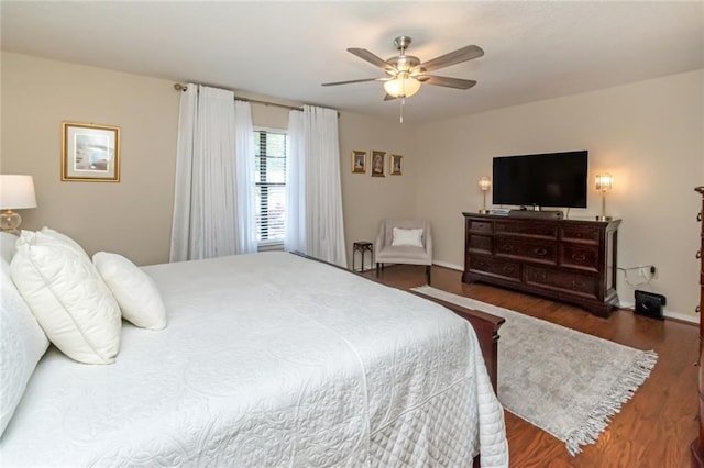 7250 Pine Station Rd S, Mobile, AL 36695 - bedroom with wood finished floors, baseboards, and a ceiling fan