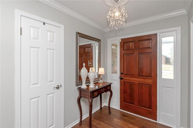 7250 Pine Station Rd S, Mobile, AL 36695 - foyer entrance with ornamental molding, dark wood-style floors, a chandelier, and baseboards