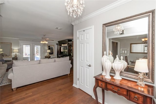 7250 Pine Station Rd S, Mobile, AL 36695 - living room with a chandelier, crown molding, wood finished floors, ceiling fan, and french doors