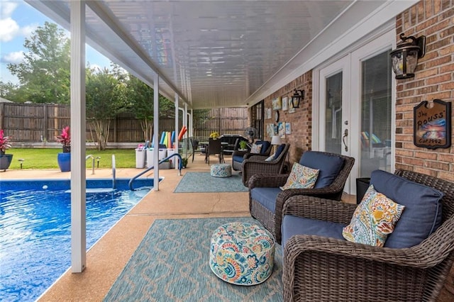7250 Pine Station Rd S, Mobile, AL 36695 - fenced backyard with an outdoor hangout area and a patio