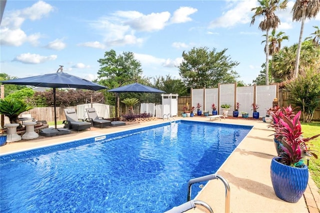 7250 Pine Station Rd S, Mobile, AL 36695 - view of swimming pool featuring a fenced backyard and a patio area