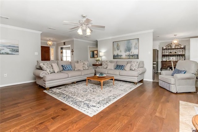 7250 Pine Station Rd S, Mobile, AL 36695 - living area featuring ornamental molding, wood finished floors, a ceiling fan, baseboards, and a chandelier