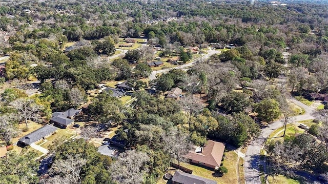 aerial view featuring a wooded view