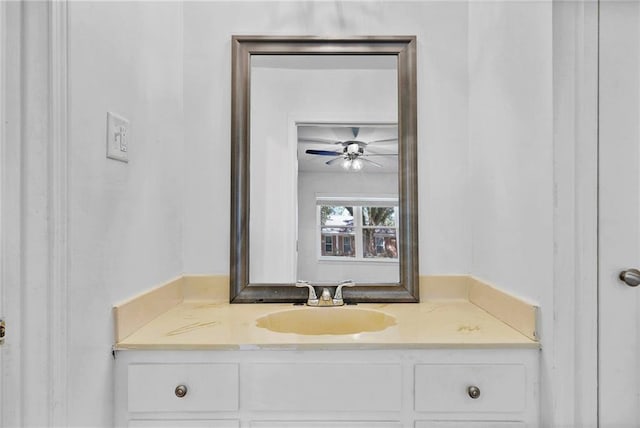 bathroom featuring ceiling fan and vanity