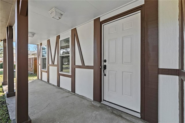 entrance to property with covered porch