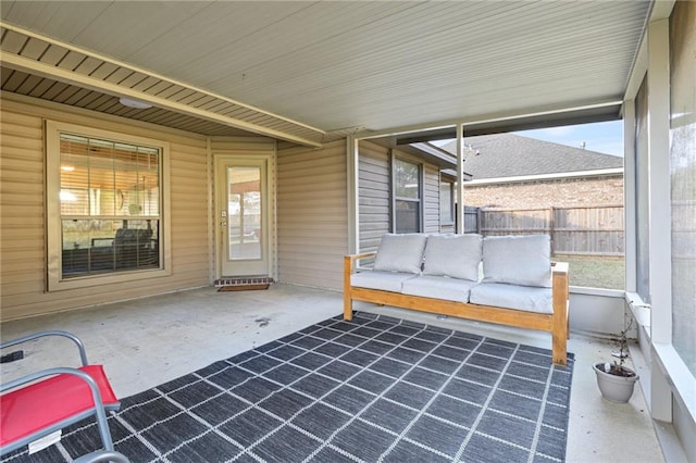 unfurnished sunroom with plenty of natural light