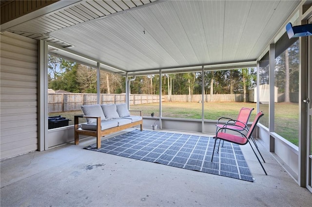 sunroom / solarium featuring plenty of natural light