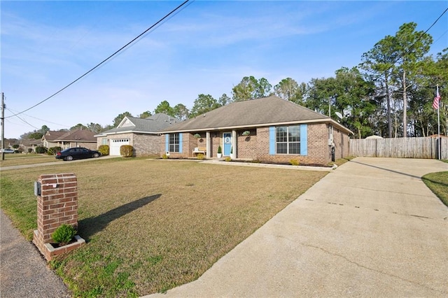 ranch-style house with driveway, brick siding, a front yard, and fence