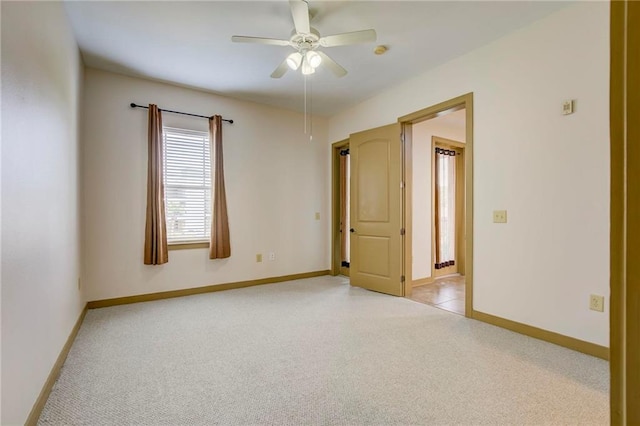 1430 Regency Rd Unit F204, Gulf Shores, AL 36542 - spare room with light colored carpet, ceiling fan, and baseboards