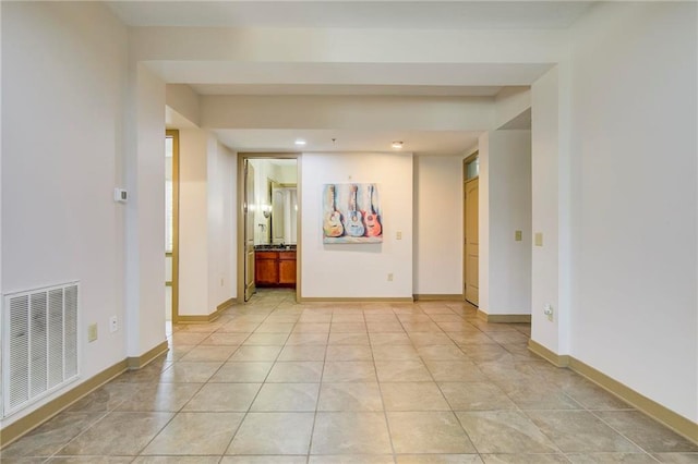 1430 Regency Rd Unit F204, Gulf Shores, AL 36542 - empty room with baseboards, light tile patterned floors, and recessed lighting