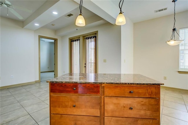 1430 Regency Rd Unit F204, Gulf Shores, AL 36542 - kitchen with light tile patterned floors, dark stone countertops, a ceiling fan, baseboards, and recessed lighting