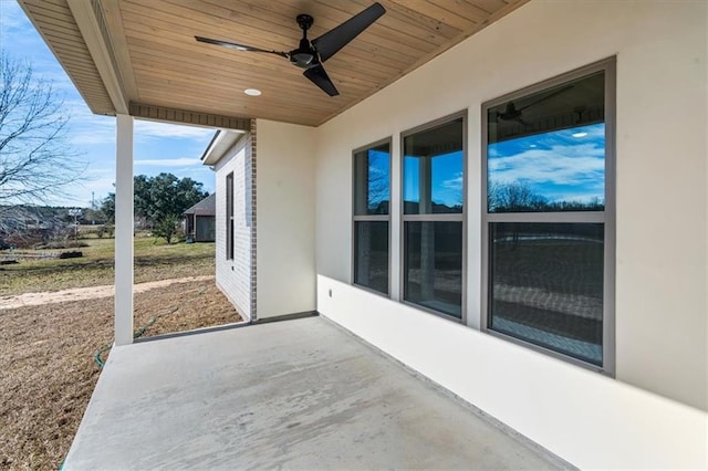 view of patio featuring ceiling fan