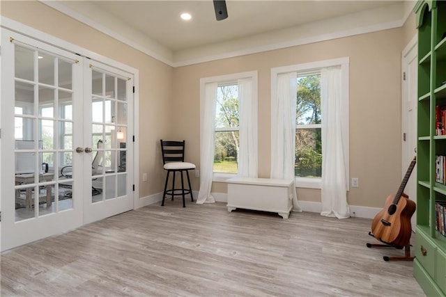 entryway featuring french doors, recessed lighting, wood finished floors, and baseboards