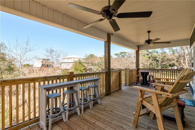 wooden terrace with ceiling fan