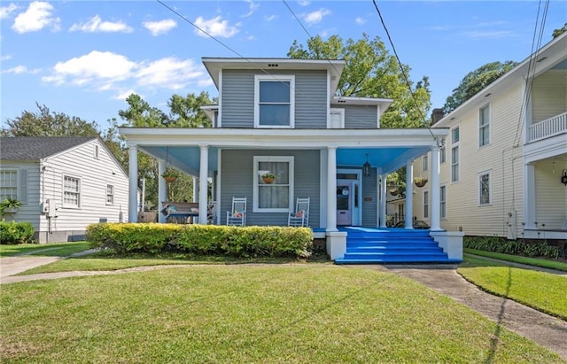 view of front facade with a porch and a front yard