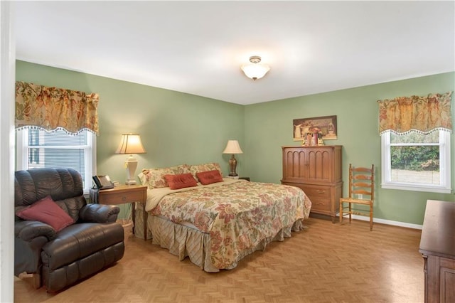 bedroom featuring baseboards