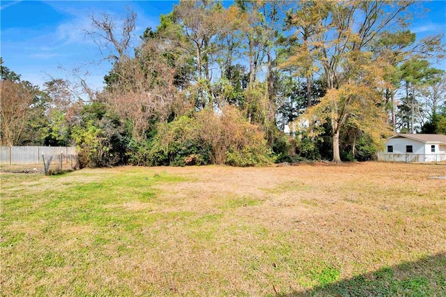 view of yard with fence