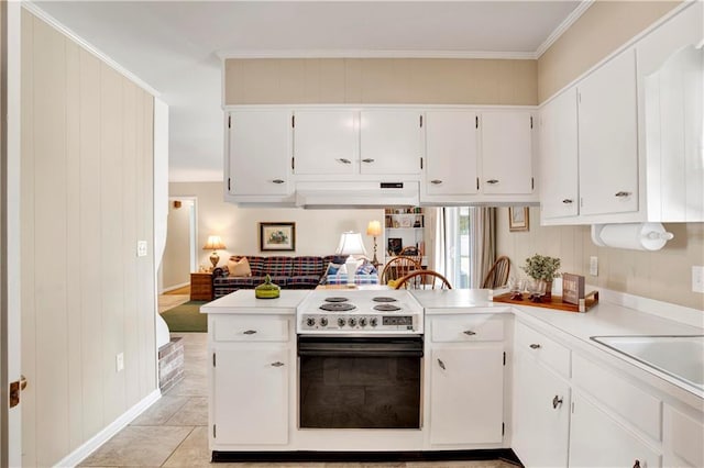 kitchen with range with electric cooktop, under cabinet range hood, light countertops, white cabinetry, and a sink