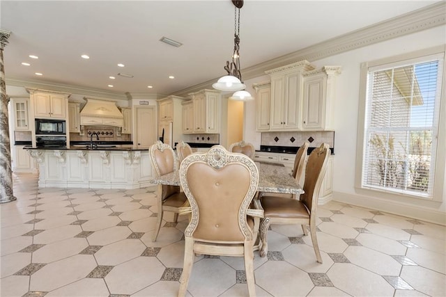 dining room featuring ornamental molding, visible vents, recessed lighting, and light floors