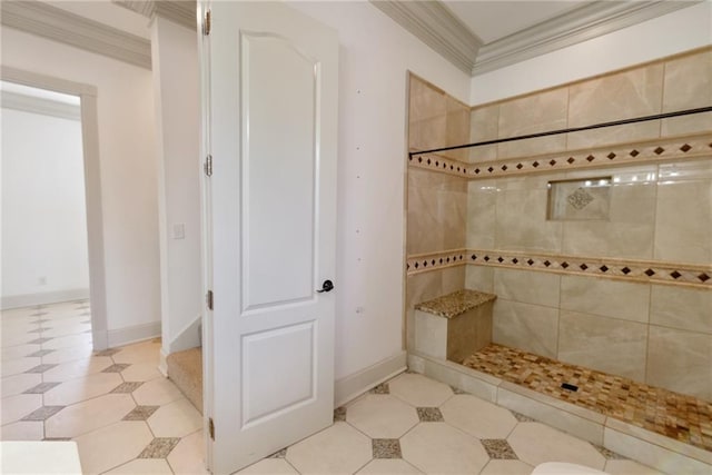 bathroom with baseboards, ornamental molding, and a walk in shower