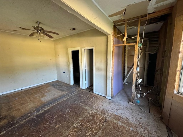 unfurnished bedroom featuring ceiling fan